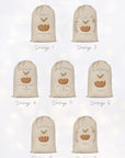Contact sheet displaying eight personalised Christmas pudding sack mockups printed on linen-look fabric. Each sack shows a different arrangement of illustrated puddings, holly, berries, and festive greenery, paired with varying text styles such as ‘Special Delivery’ arches and ‘First Christmas’ messages. Shown on a soft bokeh background for a premium, boutique feel