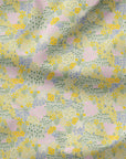 Soft pastel fabric with a scattering of yellow, pink, and lilac garden florals on a light sage green base — inspired by my Grandad’s spring garden. On Jersey fabric.