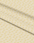 Beige fabric with pastel yellow ditsy wildflower pattern, inspired by wild chervil from a spring in Somerset