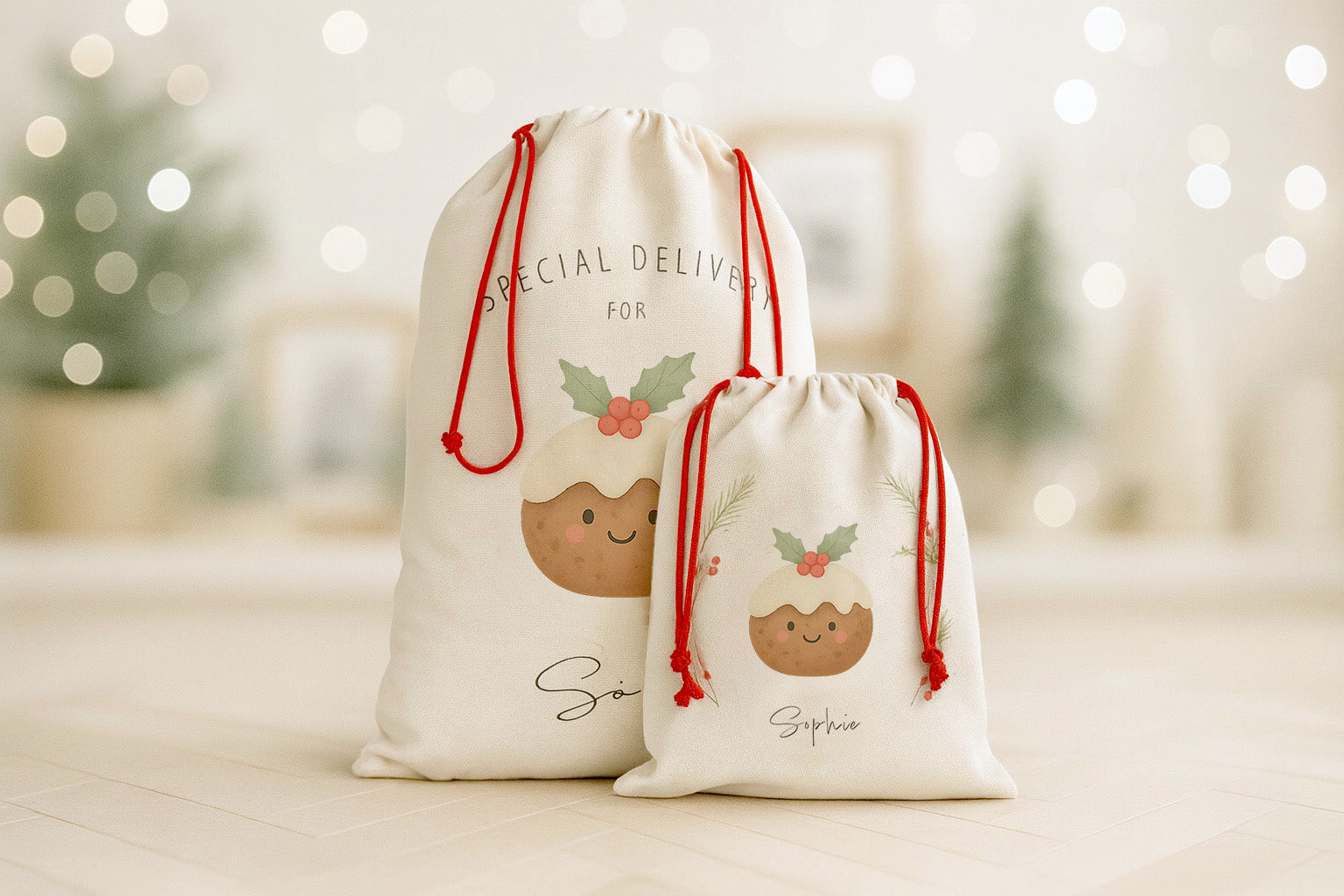 Luxury personalised Christmas sacks featuring hand-illustrated Christmas pudding designs, displayed in a softly lit festive room with blurred warm fairy lights. One large Santa sack and one smaller gift sack stand together, both made from thick linen-look fabric with bright red drawcord ties. A warm, nostalgic holiday atmosphere