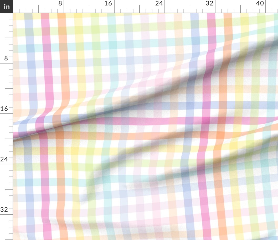 Large scale pastel rainbow gingham fabric shown flat against an inch ruler, with pink, lilac, blue, mint, lemon and peach checks on a white ground.